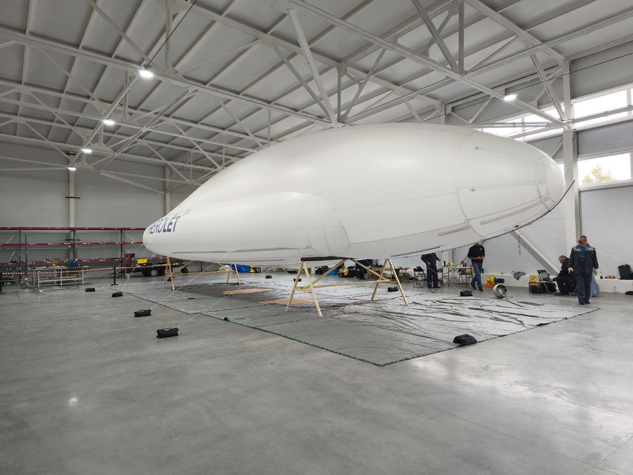 Aerolyot-01 · wide hangar view during build-up