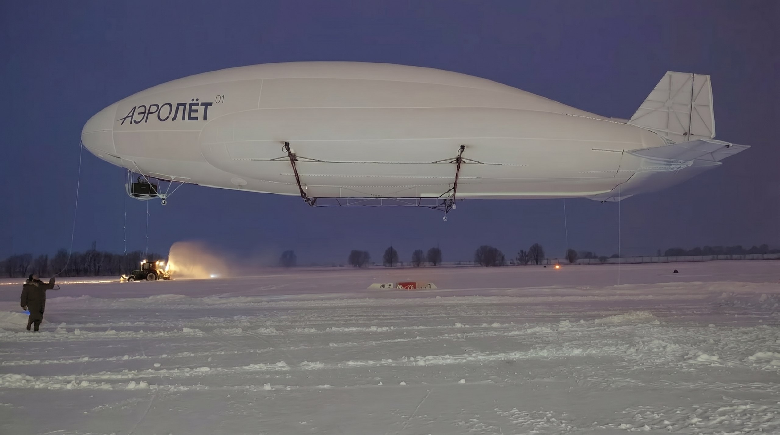 Aerolyot-01 · winter airfield operations at dusk