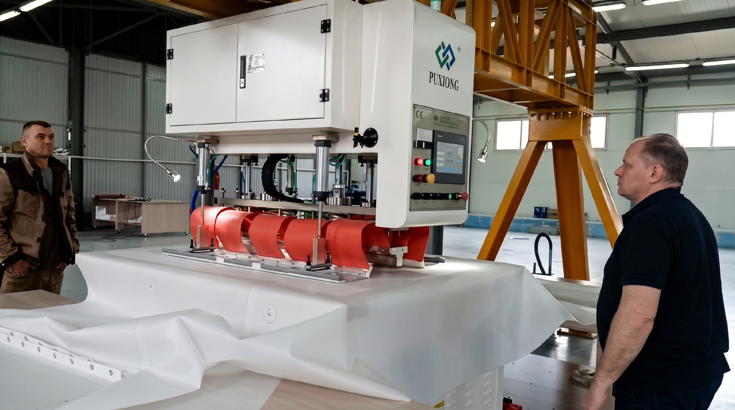 HF shell welding machine · bonding red fabric segments on the production rig