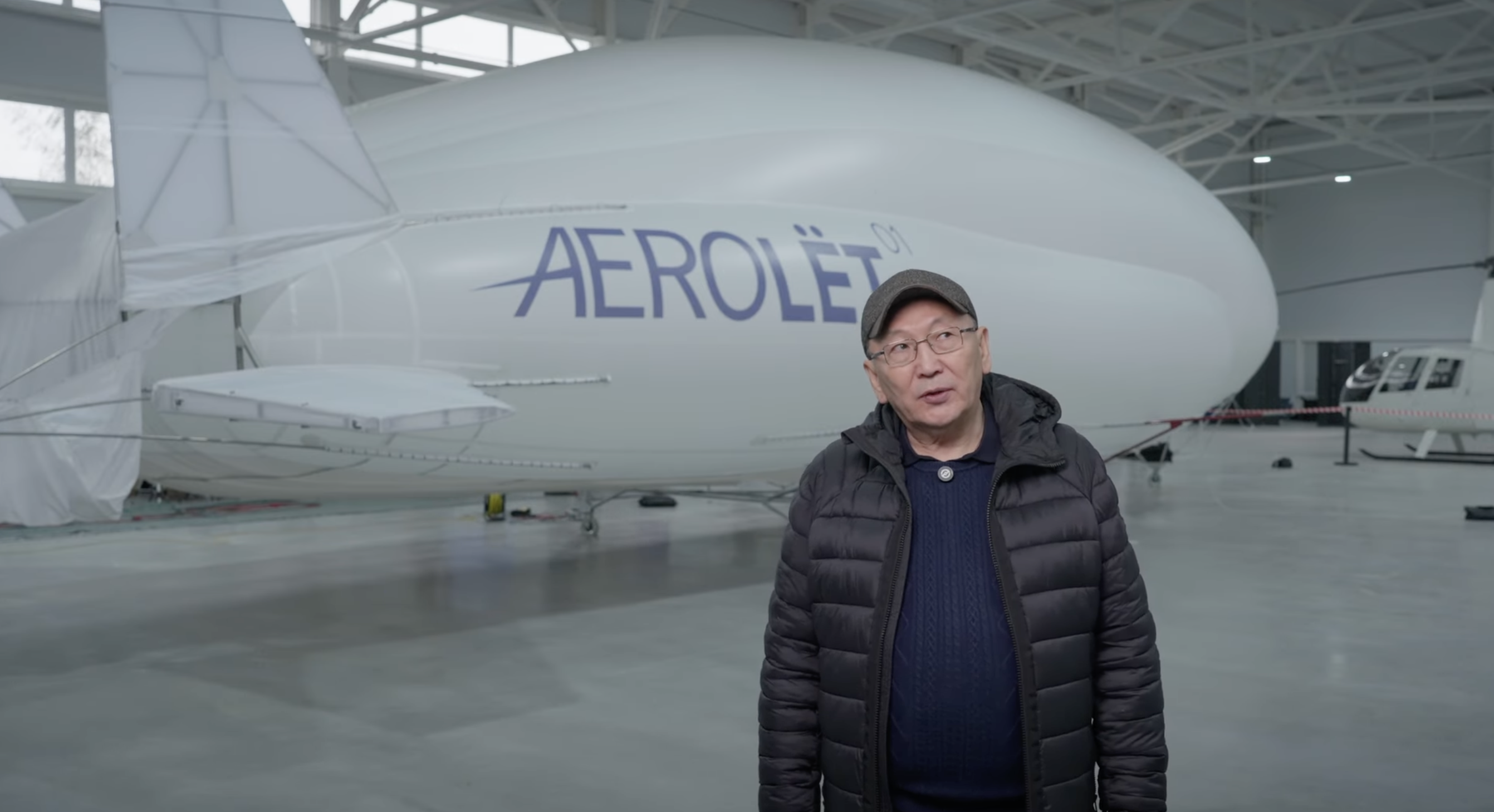 Yakutia representative in front of Aerolyot-01 in the AERONOVA hangar